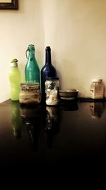 Close-up of bottles on table