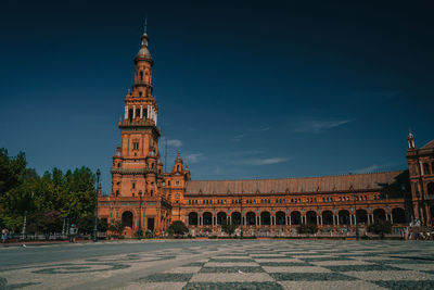 Low angle view of historic building against clear sky