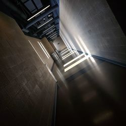 High angle view of illuminated staircase in building