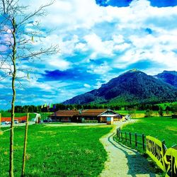 View of empty road with mountains in background