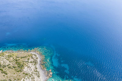 High angle view of island amidst sea