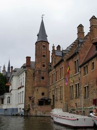 View of buildings in city against sky