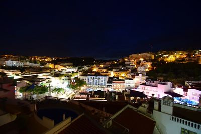 View of illuminated buildings at night