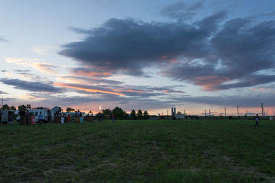 Scenic view of field against sky during sunset