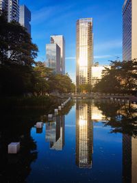Buildings in city against sky