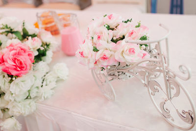 Close-up of wedding rings on table