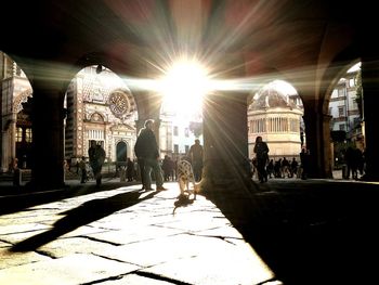 Tourists at entrance of historical building