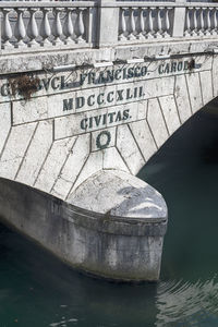 View of old bridge over river