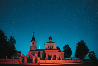 Building against blue sky at night