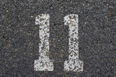 High angle view of text on road