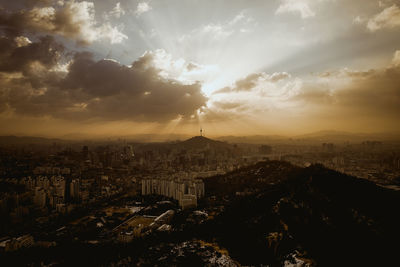 Aerial view of city at sunset