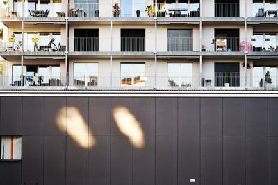 Reflection of building on glass window