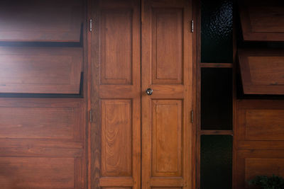 Closed wooden door of building