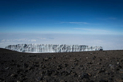 Ice wall on barren landscape