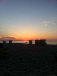 Scenic view of beach during sunset