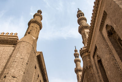 Low angle view of temple against building