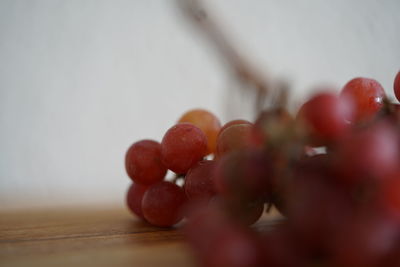 Close-up of grapes on table