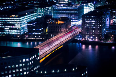 High angle view of light trails on city at night