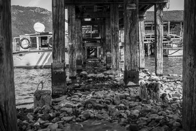 View of abandoned building by sea