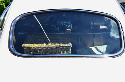Reflection of car on side-view mirror