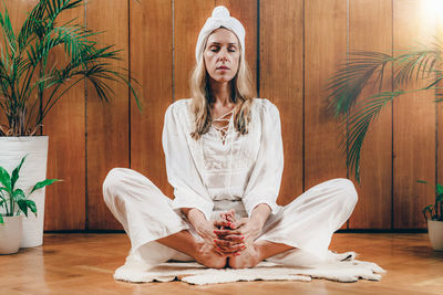Woman practicing kundalini yoga for feminine energy
