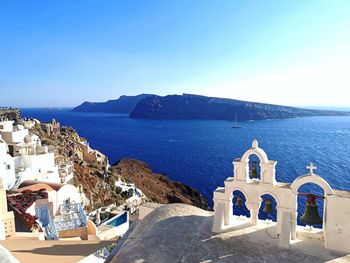 Scenic view of sea against clear blue sky