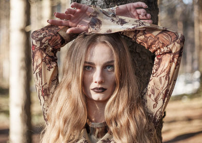 Portrait of young woman looking away