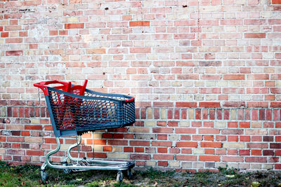 Red box against brick wall