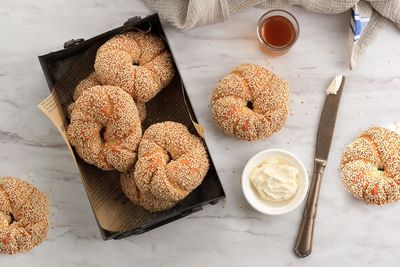 Turkish simit homemade traditional turkish pastry. turkish round braided bagel with sesame seeds