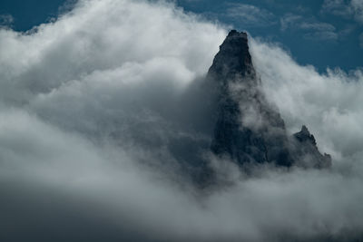 Top of mountain in the clouds close to chamonix mont blanc