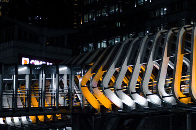 Interior of illuminated factory at night