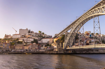 Low angle view of dom luis i bridge over douro river in city