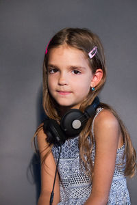 Portrait of a teenage girl against white background