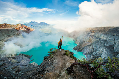 Scenic view of volcanic mountain against sky