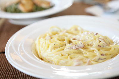 Close-up of noodles in bowl on table