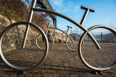 Bicycle wheel against sky