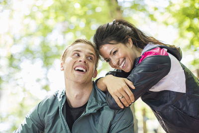 Happy multi-ethnic fit couple outdoors