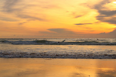 Scenic view of sea against sky during sunset