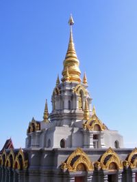 Low angle view of temple building against clear sky