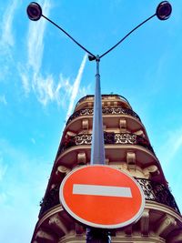 Low angle view of building against blue sky