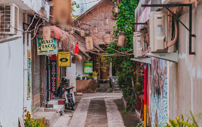 Alley amidst buildings in city