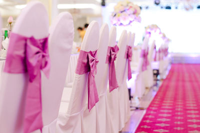 Row of chairs arranged at party