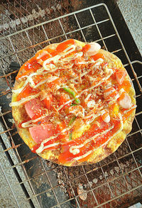 High angle view of meat on barbecue grill