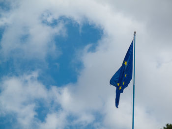 Low angle view of european union flag against sky