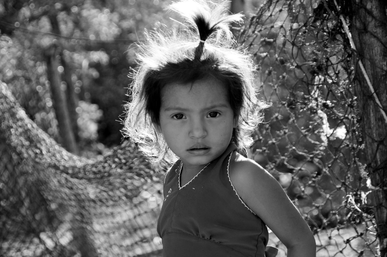children only, child, childhood, portrait, one girl only, looking at camera, innocence, one person, outdoors, people, day, close-up, human body part, nature