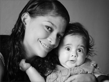 Portrait of smiling mother and son