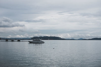 Boat in sea against sky