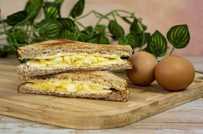 Simple egg sandwich for a healthy breakfast. blurred background