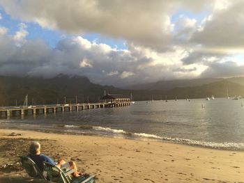 Scenic view of sea against cloudy sky
