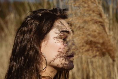 Close-up portrait of woman looking away